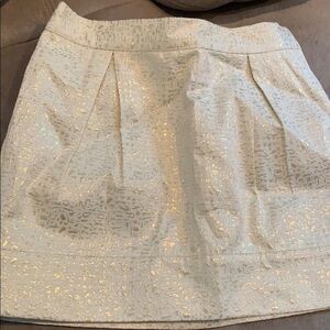 Gold flecks on cream colored skirt, fully lined